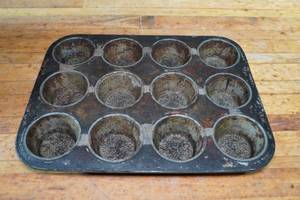lot 337E image: 16 Cupcake Baking Sheets - 12 Count