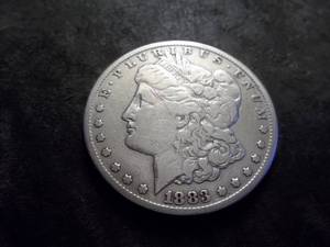 lot 13 image: 1883 CC Morgan Silver Dollar