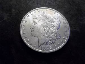 lot 16 image: 1885 O Morgan Silver Dollar