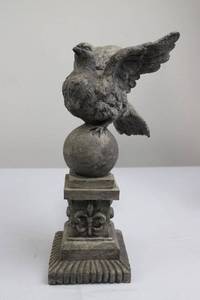 lot 9 image: Cast Stone Bird Finial on Orb Pedestal with Fleur-de-Lis Base
