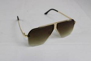 lot 16 image: Gucci Gold-Tone Sunglasses - Gradient Brown Lenses - Made in Italy