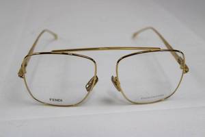 lot 17 image: Fendi FF 0445 001 Gold-Tone Sunglasses - 57-16-145 Made in Italy
