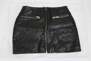 lot 53 image: GUESS Gift Bag Lot of BEBE Tops & Leather Skirts (Lot of 8)