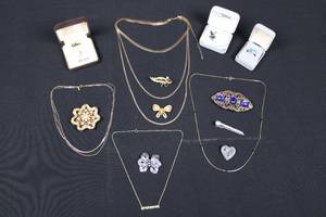 lot 73 image: Costume Jewelry Assortment - Layered Necklaces, Floral Brooches, Turquoise Ring