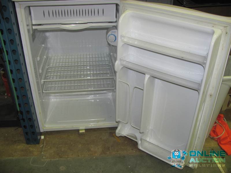 lot 47 image: This GE 4.0 Cubic Foot Refrigerator is the pe...