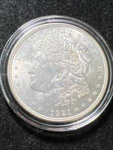 lot 33 image: 1921 US MORGAN SILVER DOLLAR UNC IN AIRTITE