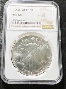 lot 45 image: 1990 AMERICAN SILVER EAGLE NGC MS69