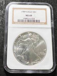 lot 56 image: 1989 AMERICAN SILVER EAGLE NGC MS69