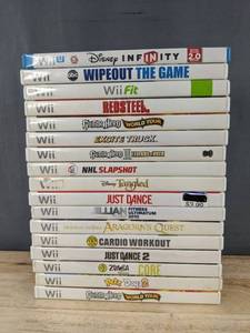 Nintendo Wii 17 Game Bundle - Red Steel, Guitar Hero World Tour, NHL Slapshot, Tangled, Just Dance, Zumba, Guitar Hero C
