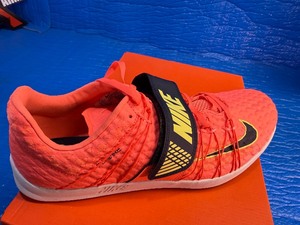 lot 97 image: Size 11.513 Nike Triple Jump Elite athletic shoe box, with a listed retail price of USD $125.00