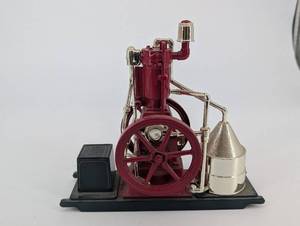 lot 30 image: Miniature Steam Engine Model - Red Cast Iron with Brass Piping & Flywheel