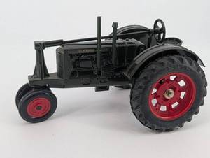 lot 37 image: Massey Harris Challenger Tractor - Vintage Die-Cast Display Model