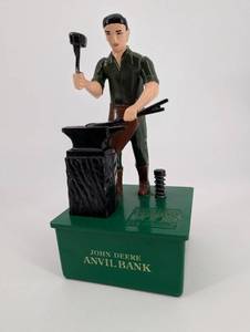 lot 43 image: John Deere Anvil Bank - Vintage Promotional Metal Bank with Blacksmith Figure