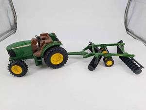 lot 66 image: John Deere Toy Tractor With Disc Harrow Farm Implement