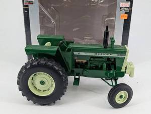 lot 82 image: Oliver 1900 Wheatland Tractor - Diesel Diecast Model by SpecCast Collectibles