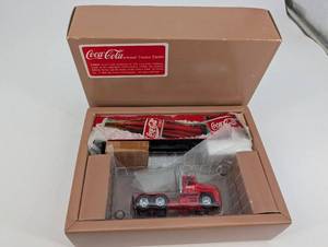 lot 88 image: Coca-Cola Tractor Trailer - Red Die-Cast Toy Truck in Original Box