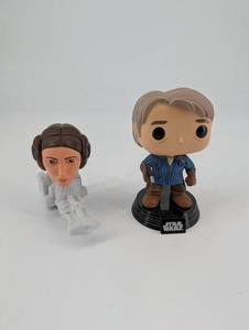 lot 94 image: Funko Pop Star Wars Leia Organa & Han Solo Figures (Lot of 2)