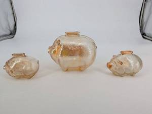 lot 130 image: Glass Piggy Banks (Lot of 3) - Hammered Clear Pink Glass Pigs
