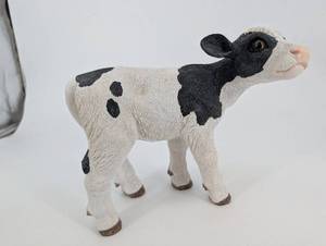 lot 137 image: Holstein Cow Figurine - 9 in Long