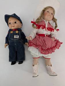 lot 147 image: Lee Denim Overalls Boy Doll & Red Gingham Dress Girl Doll (Lot of 2)