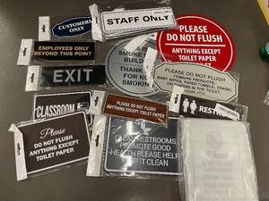 lot 35 image: collection of business signs