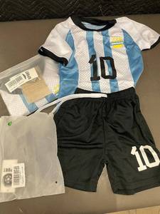 lot 95 image: Blue & White Striped Soccer Jersey #10 with Black Shorts