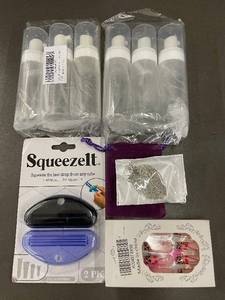 lot 135 image: Squeezelt Universal Tube Squeezer (Lot of 4) - 4 Squeezers & Travel Bottles