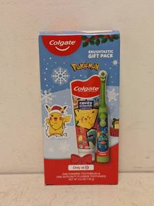 lot 43 image: NEW COLGATE BUSHTASTIC GIFT PACK POKMON POWERED TOOTHBRUSH AND TOOTHPASTE