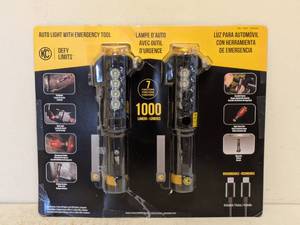 lot 188 image: NEW KC AUTO LIGHT WITH EMERGENCY TOOL