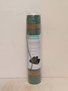 lot 191 image: NEW NAUTILUS HIGH PERFORMANCE YOGA MAT WITH STRAP GREEN