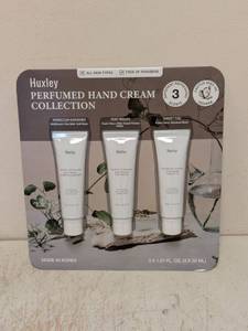 lot 216 image: NEW HUXLEY PERFUMED HAND CREAM COLLECTION 3PK