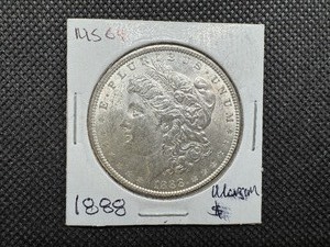 lot 6 image: 1888 Morgan Silver Dollar Marked MS 64 when purchased