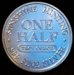 lot 31 image: 12 oz .999 Silver Sunshine Minting Round