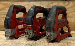 lot 63 image: Milwaukee Grease Gun lot of 3