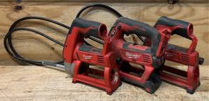 lot 64 image: Milwaukee Grease Gun lot of 3