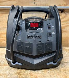 lot 99 image: Schumacher Instant Power Portable Jump Starter with Air Compressor and Light, 12 Volts, 1200 Peak Amps, Model# SJ1332 #81698 Msrp $199.99
