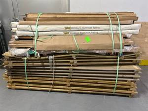 lot 153 image: Lot of Vinyl Flooring Transitions, Wood and Door Trim and 4x8 Fence Panels