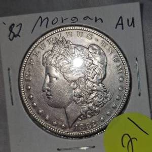 lot 21 image: 1882 Morgan Dollar $1 AU Condition