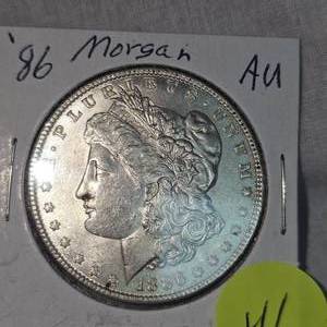 lot 41 image: 1886 Morgan Dollar $1 AU Condition