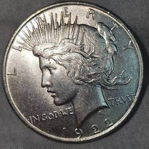 lot 56 image: 1922 Peace Dollar $1 AU Slight Tone