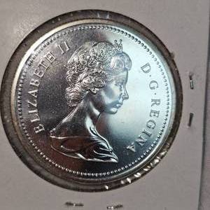 lot 111 image: 1975 Canada Calgary Silver $1 UNC