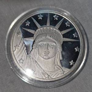 lot 84 image: Liberty 1 oz t, .999 Silver Round