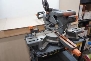 lot 49 image: Evolution Multi-Material Sliding Mitre Saw
