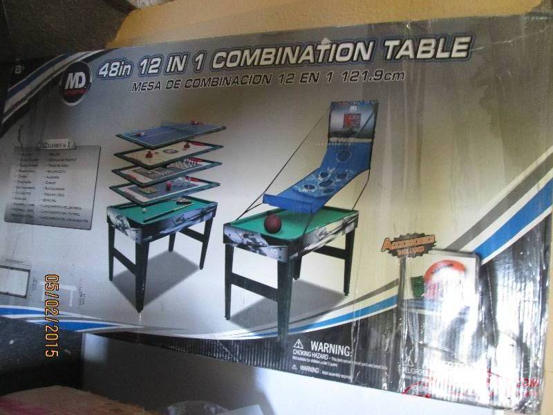 lot 10 image: 48 inch 12 in one game station.  No...