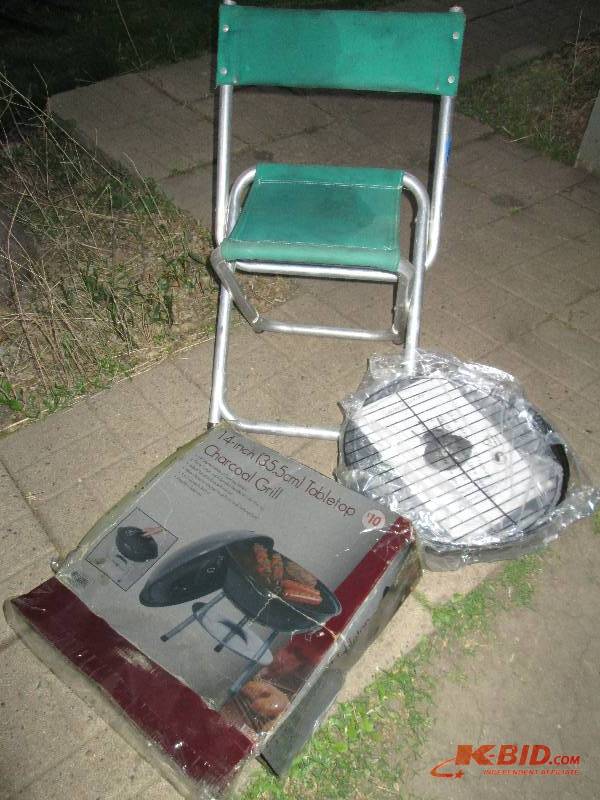 lot 102 image: unused charcoal grill and a camp st...