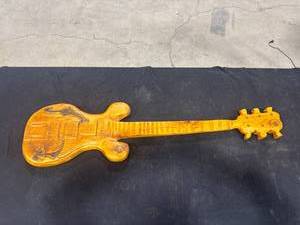 lot 2432 image: Carved Wooden Guitar Wall Hanging