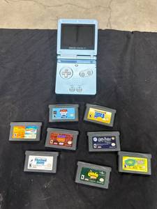 lot 2478 image: Game Boy Advance SP & Games