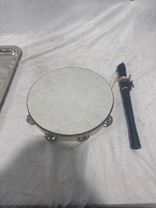 lot 2523 image: Tambourine and Wind Instrument Set