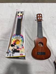 lot 2650 image: Two Ukuleles Mickey Mouse & Wood