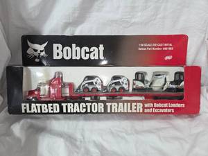 Bobcat Semi With Equipment